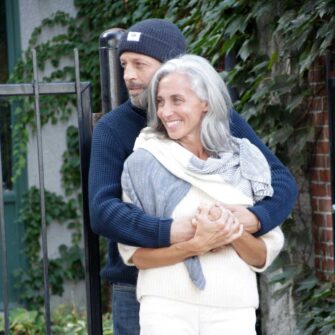 Swans Island Company's Triangle Shawl - Knit with soft luxurious silk/ merino wool, handdyed in our Maine studio. Knit in USA. Shon here in Graphite / Natural