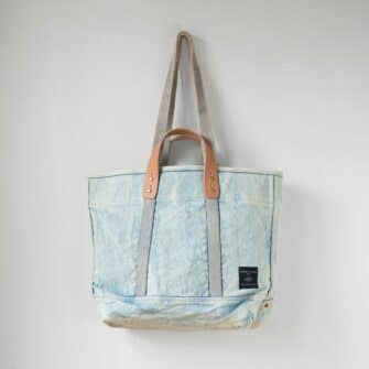 Swans Island Company's Canvas Totes by Immodest Cotton. Sturdy canvas tote with detachable leather handles. Shown here in Acid Wash color.