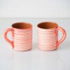 Swans Island Compass Classic Terracotta Striped Mug. Handcrafted in Portugal. Shown here in Red. Set of two.