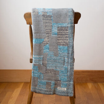 Upcycled Artisanal Patchwork Throw #32- an artisanal knt throw. Made in USA with reclaimed cotton and other blended yarns. Each one is unique,