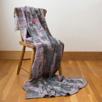 Upcycled Artisanal Patchwork Throw #33- an artisanal knt throw. Made in USA with reclaimed cotton and other blended yarns. Each one is unique,