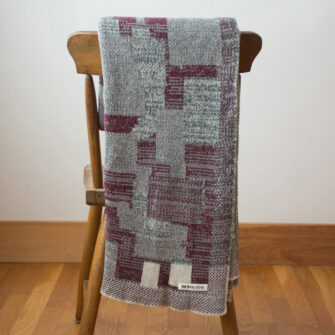 Upcycled Artisanal Patchwork Throw #34- an artisanal knt throw. Made in USA with reclaimed cotton and other blended yarns. Each one is unique,