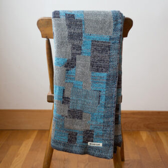 Upcycled Artisanal Patchwork Throw #35- an artisanal knt throw. Made in USA with reclaimed cotton and other blended yarns. Each one is unique,