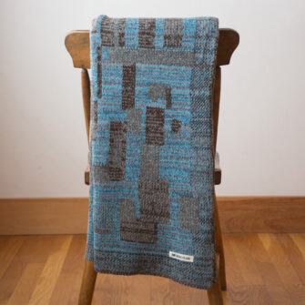 Upcycled Artisanal Patchwork Throw #38- an artisanal knt throw. Made in USA with reclaimed cotton and other blended yarns. Each one is unique,