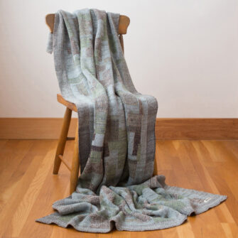 Upcycled Artisanal Patchwork Throw #41- an artisanal knt throw. Made in USA with reclaimed cotton and other blended yarns. Each one is unique,