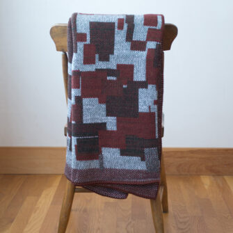 Upcycled Artisanal Patchwork Throw #22- an artisanal knt throw. Made in USA with reclaimed cotton and other blended yarns. Each one is unique,