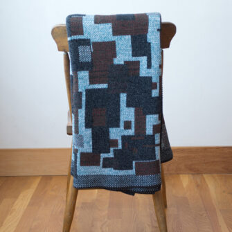 Upcycled Artisanal Patchwork Throw #24- an artisanal knt throw. Made in USA with reclaimed cotton and other blended yarns. Each one is unique,