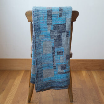 Upcycled Artisanal Patchwork Throw #25- an artisanal knt throw. Made in USA with reclaimed cotton and other blended yarns. Each one is unique,