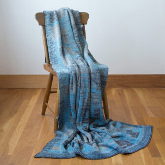 Upcycled Artisanal Patchwork Throw #25- an artisanal knt throw. Made in USA with reclaimed cotton and other blended yarns. Each one is unique,