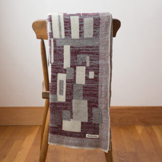 Upcycled Artisanal Patchwork Throw #29 - an artisanal knt throw. Made in USA with reclaimed cotton and other blended yarns. Each one is unique,