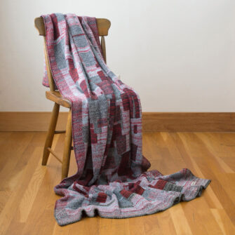 Upcycled Artisanal Patchwork Throw #28 - an artisanal knt throw. Made in USA with reclaimed cotton and other blended yarns. Each one is unique,