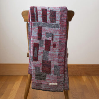 Upcycled Artisanal Patchwork Throw #28 - an artisanal knt throw. Made in USA with reclaimed cotton and other blended yarns. Each one is unique,