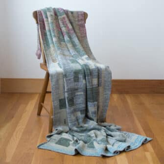 Upcycled Artisanal Patchwork Throw #21- an artisanal knt throw. Made in USA with reclaimed cotton and other blended yarns. Each one is unique,