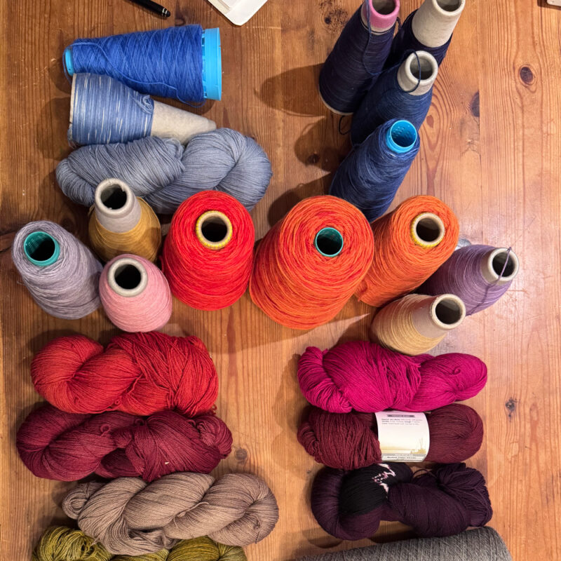 sun rises and sets. Handwoven in Maine with hand-dyed wools - a textiles collectors piece. Over 20 colors of hand-dyed yarns in the design studio.