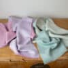 Swans Island Company's Reversible Suri Alpaca Scarf in Aquamarine / Soft Aqua and Soft Pink / Light Purple.
