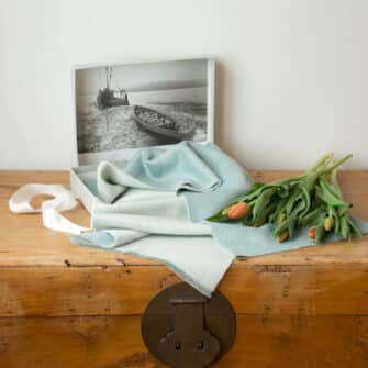Swans Island Company's Reversible Suri Alpaca Scarf in Aquamarine and Soft Aqua. With signature gift box.