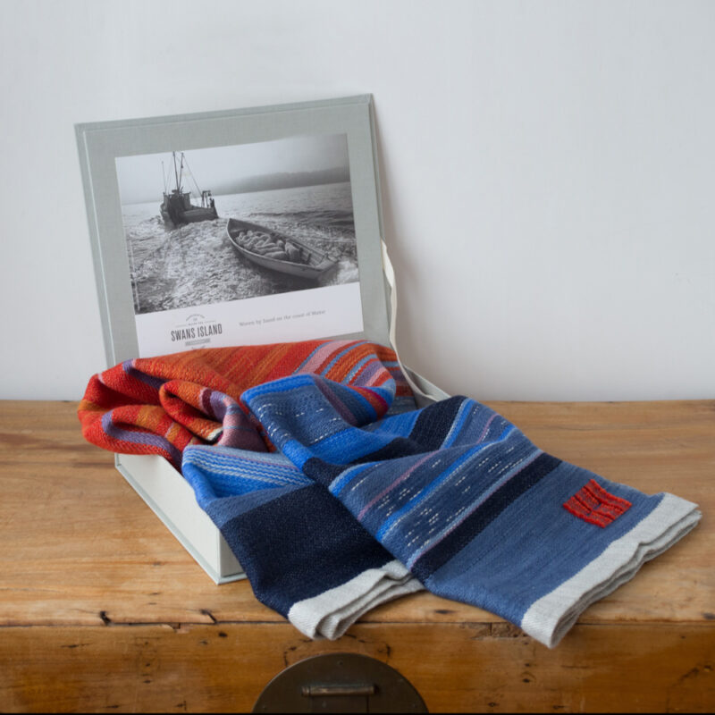 Swans Island Company's Horizon Limited Edition 2026 Throw - A tangible homage to the vibrant colors of first light and golden hour when the sun rises and sets. Handwoven in Maine with hand-dyed wools - a textiles collectors piece. Each throw arrives in our signature linen gift box.