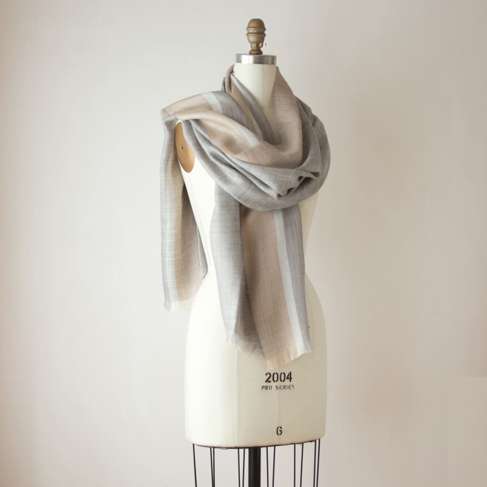 Swans Island Company's Gossamer Alpaca Shawl is whisper thin baby alpaca in undyed natural colors. Shown here in LIght Grey & Beige.